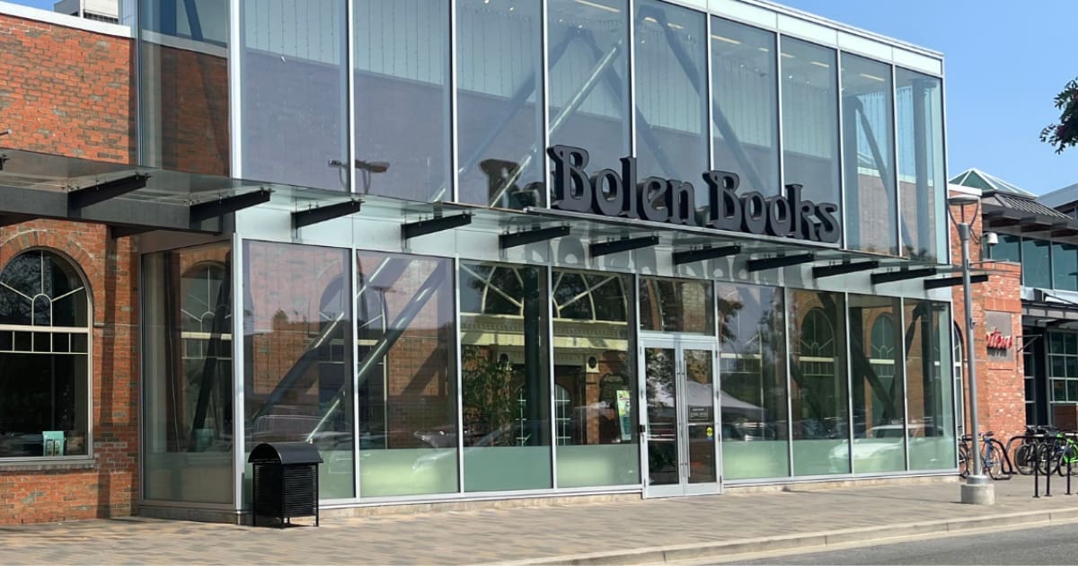 The exterior of Bolen Books, an independent bookstore in Victoria, with large glass windows.